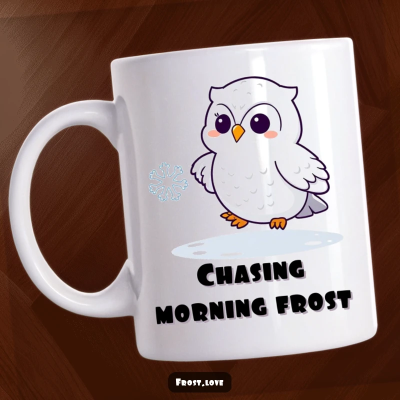 Funny Kawaii snowy owl playfully chasing a snowflake, cute arctic bird mug, humorous winter scene.